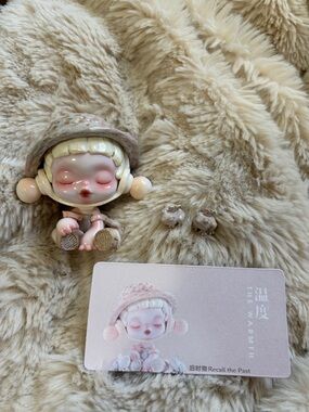 Skullpanda Sleeping Doll Figurine in Soft Beige PopMart